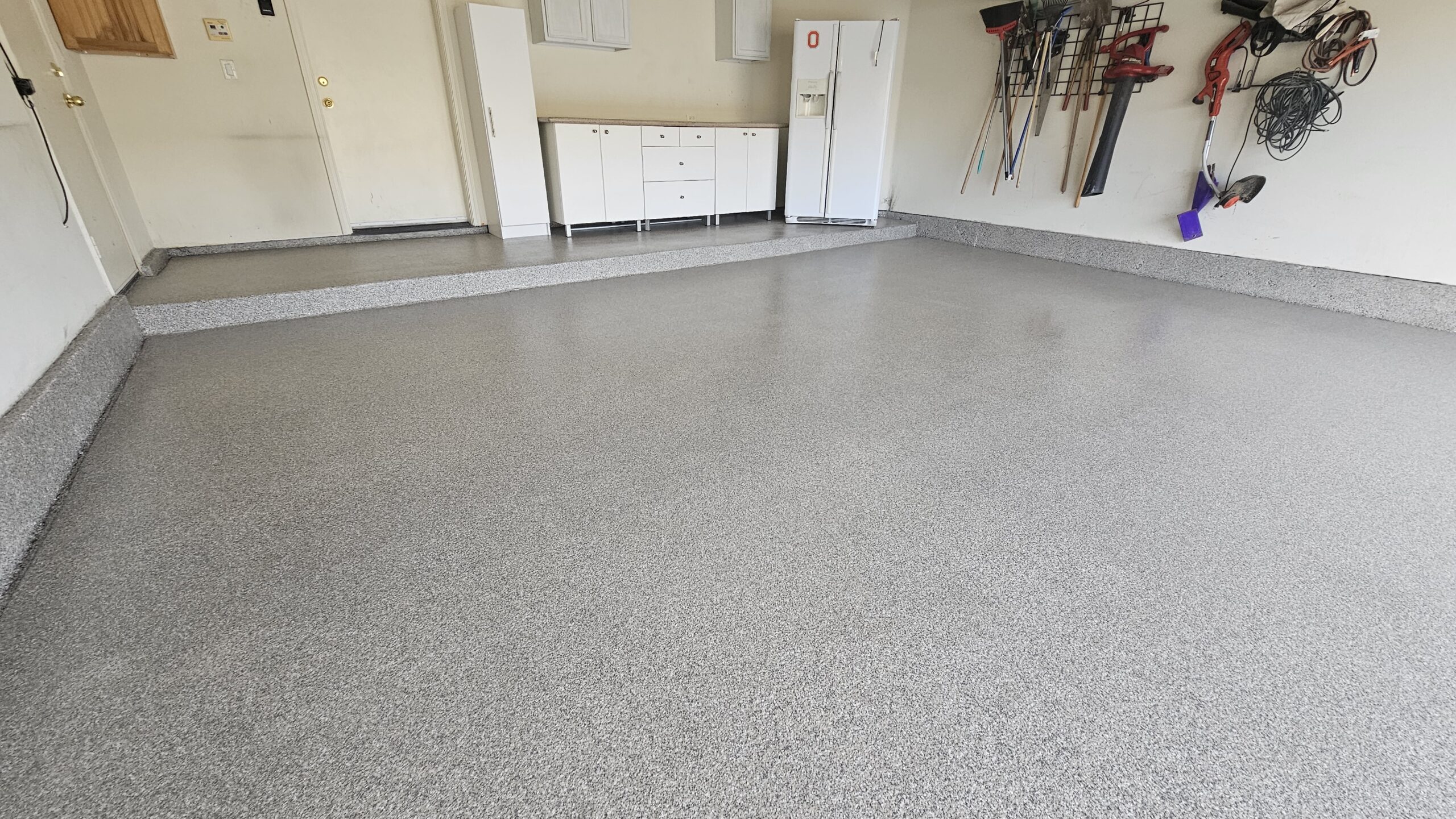 Garage Epoxy Flake Floor with stem walls
