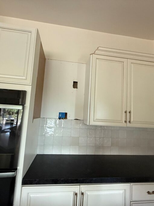 After cabinet and microwave are removed